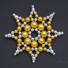 kovová hvězda žluto-stříbrná