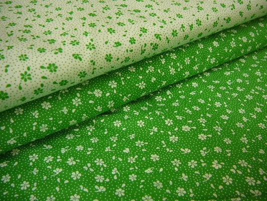 Bavlněná látka metráž JI - bílá kytička na zelené - š. 150 cm