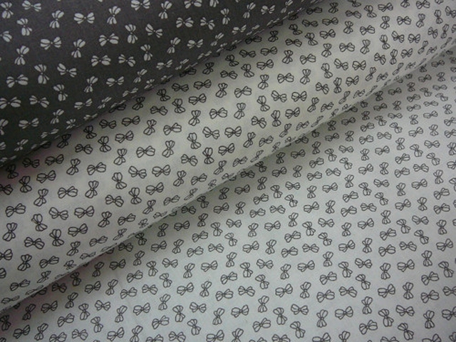 Bavlněná látka - metráž - šedé mašličky na bílé - š. 150 cm