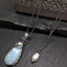 Modrý opál s říčními perlami + řetízek s perlou
