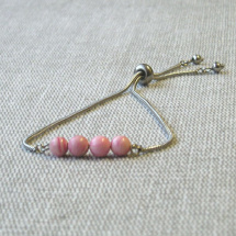 Ocelový náramek a růžová perleť..