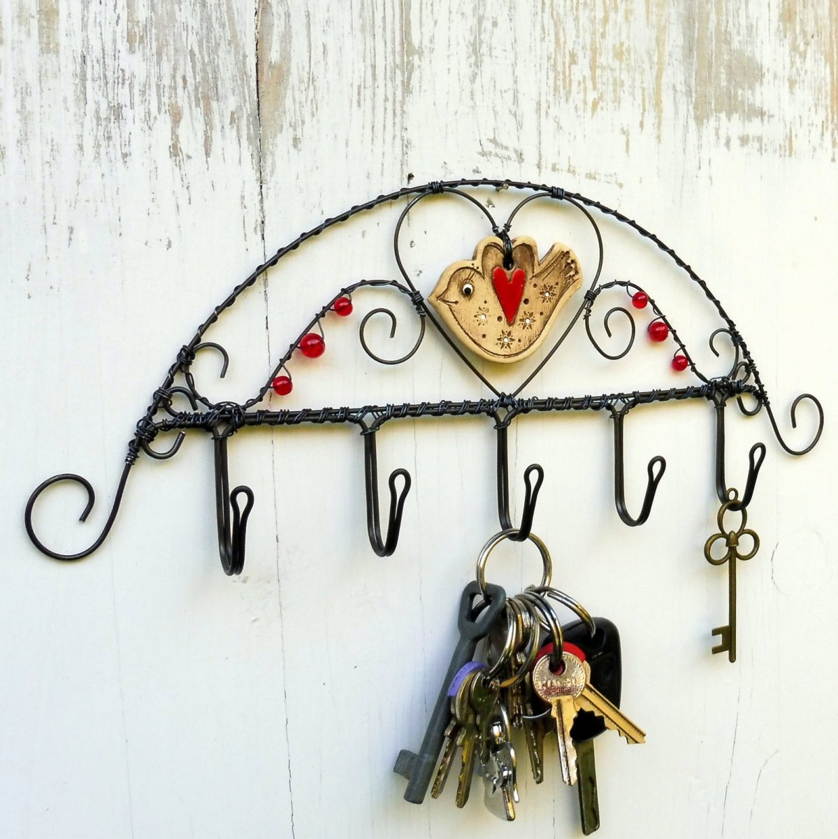 Věšák s ptáčkem