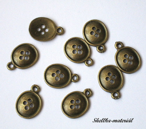 1608.Knoflíky/17x12mm/ 10 kusů