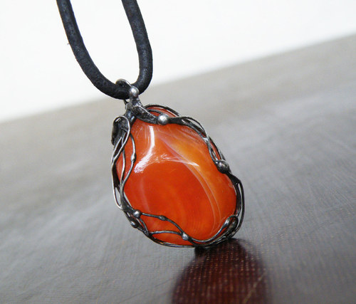 Spoutaný oheň...(Karneol) oboustranný 