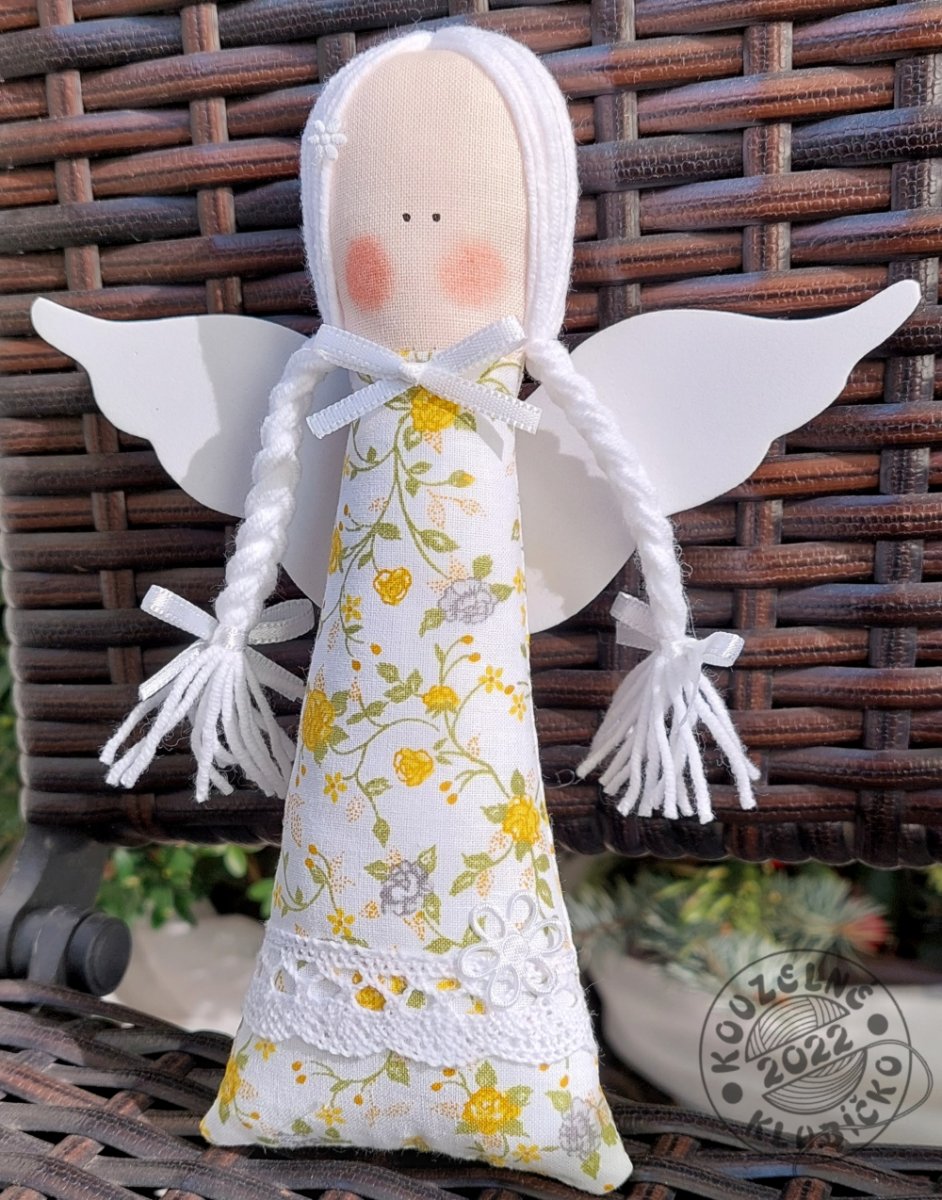 Andělka se žlutými a šedými růžičkami