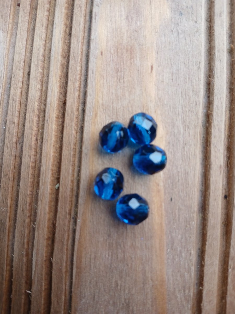 skleněný broušený korálek modrý