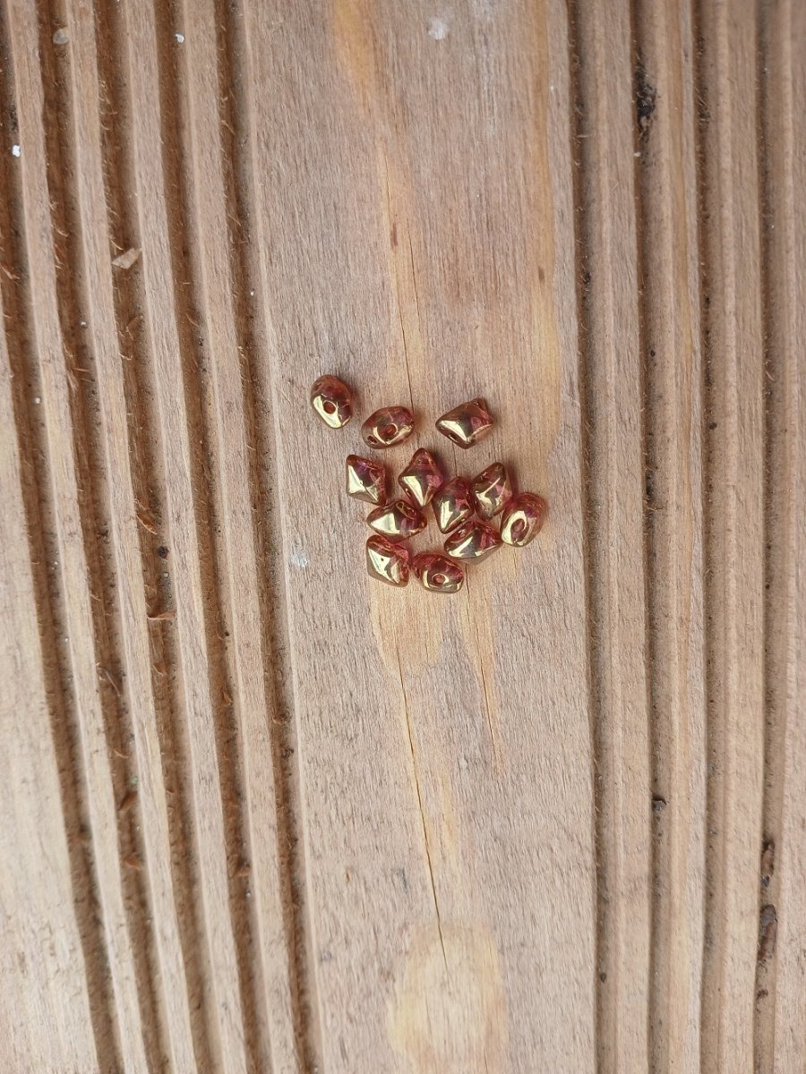 korálek mačkaný Vario zlatý pokovený