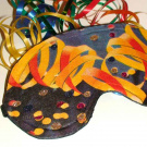Pod maskou.......