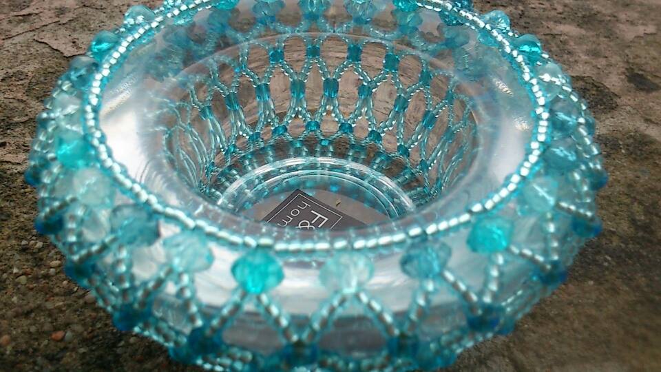 Svícinek v barvě moře 