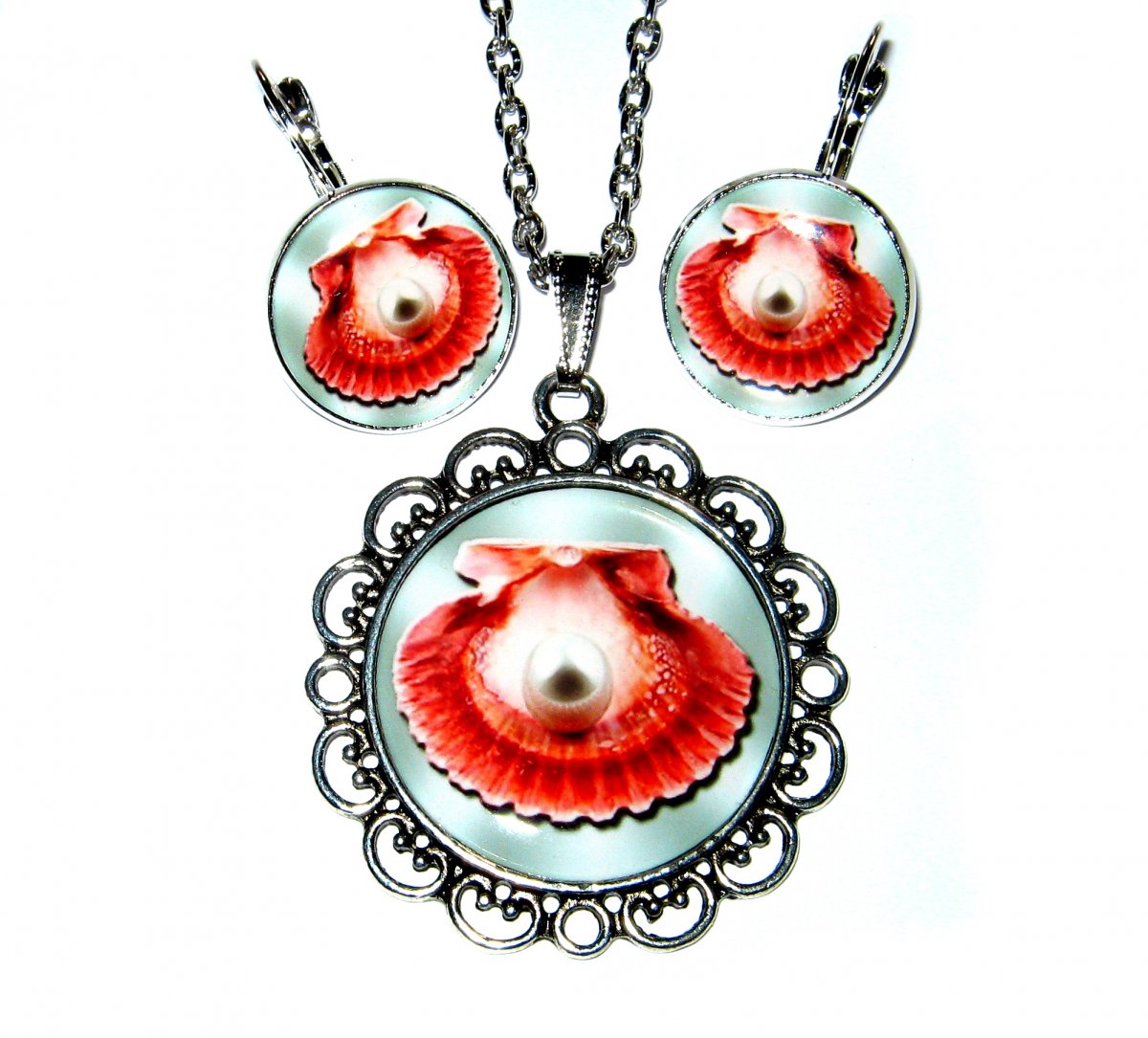 Souprava...Symbol mušle a perly.