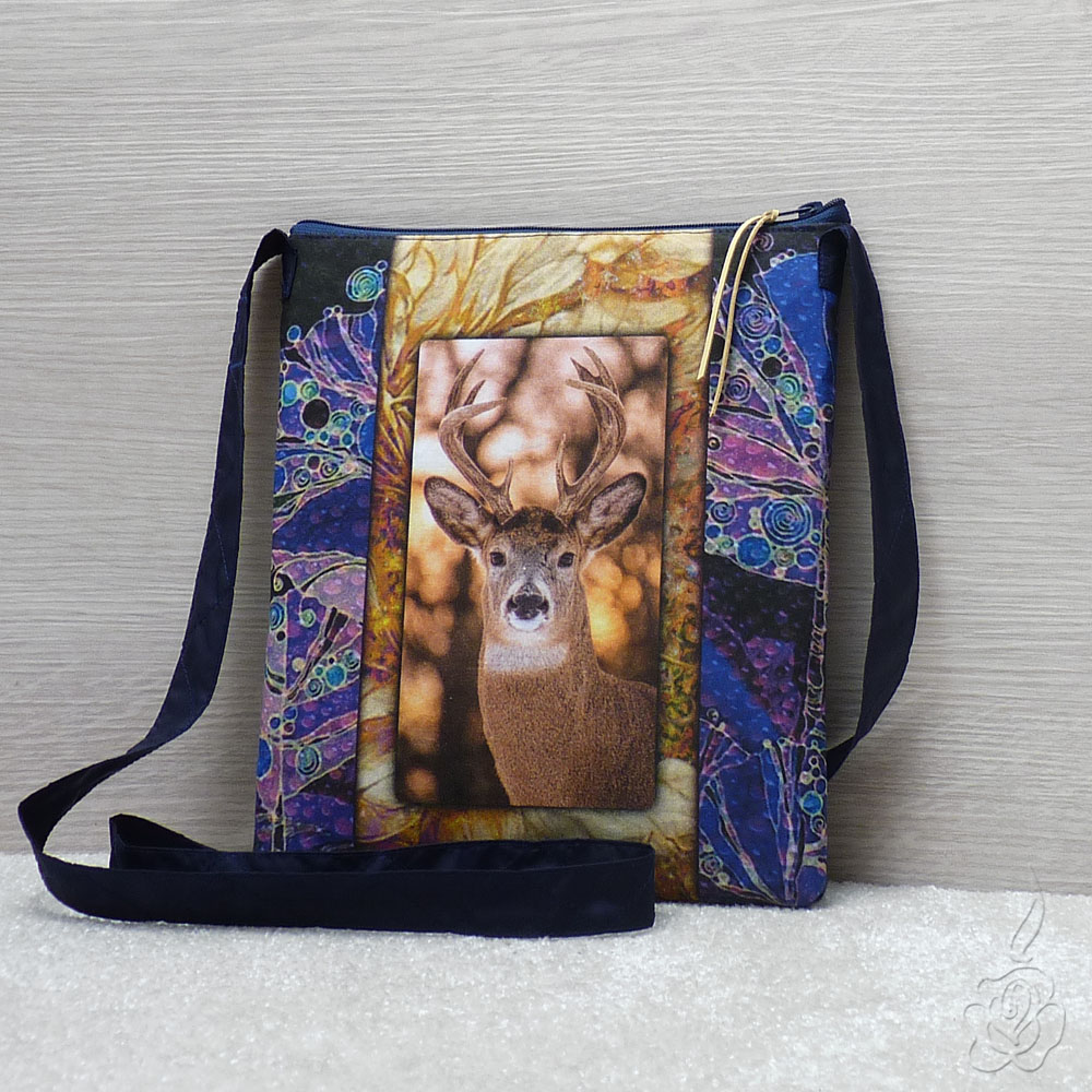 Menší barevná kabelka s jelínkem