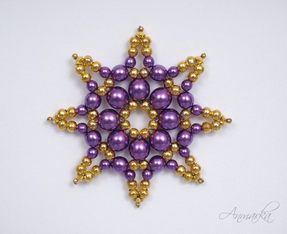 kovová hvězda zlato-fialová