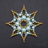 kovová hvězda tyrkysově-zlatá