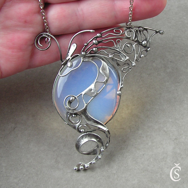 Bílý drak ochránce - Opalit