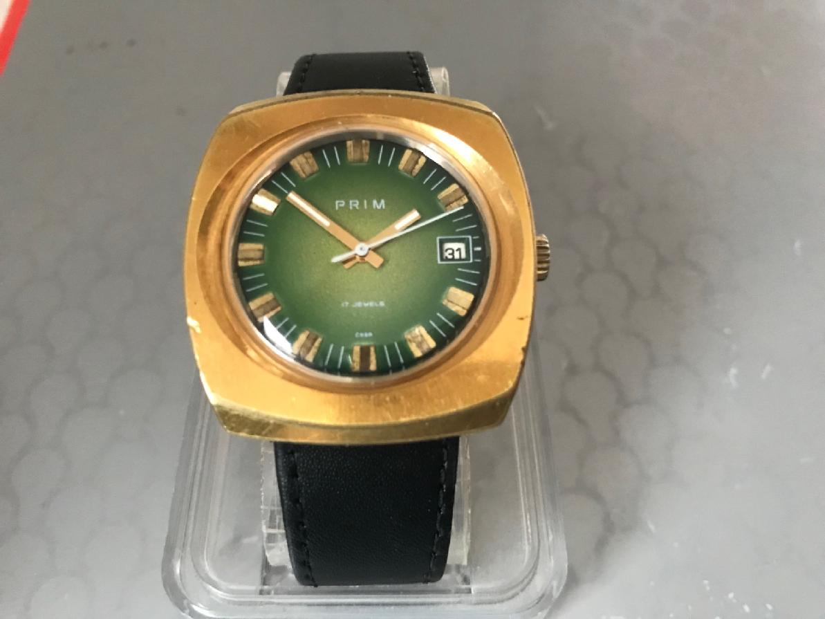 Hodinky Prim s datumem z roku 1975, masivní zlacené