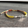 Náramek Shamballa s kovovým ornamentem