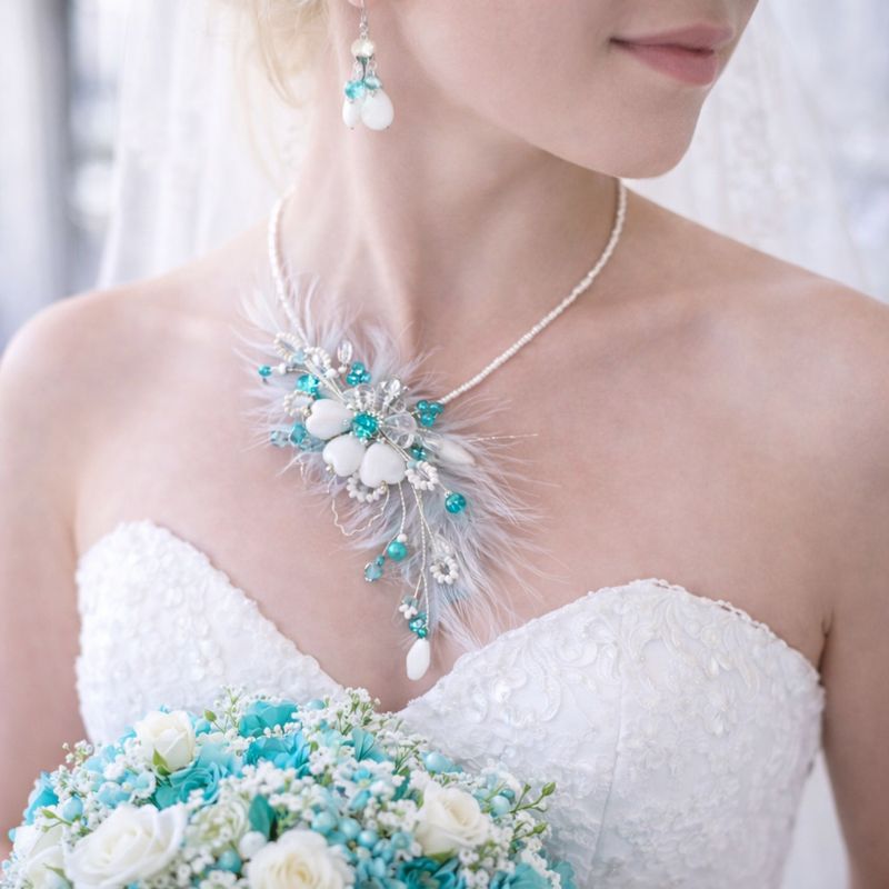 Ručně vyráběný květinový náhrdelník a náušnice v tyrkysové s peřím
