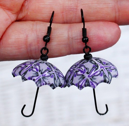 i v dešti elegantní  :-)  deštníčky , deštníky do uší