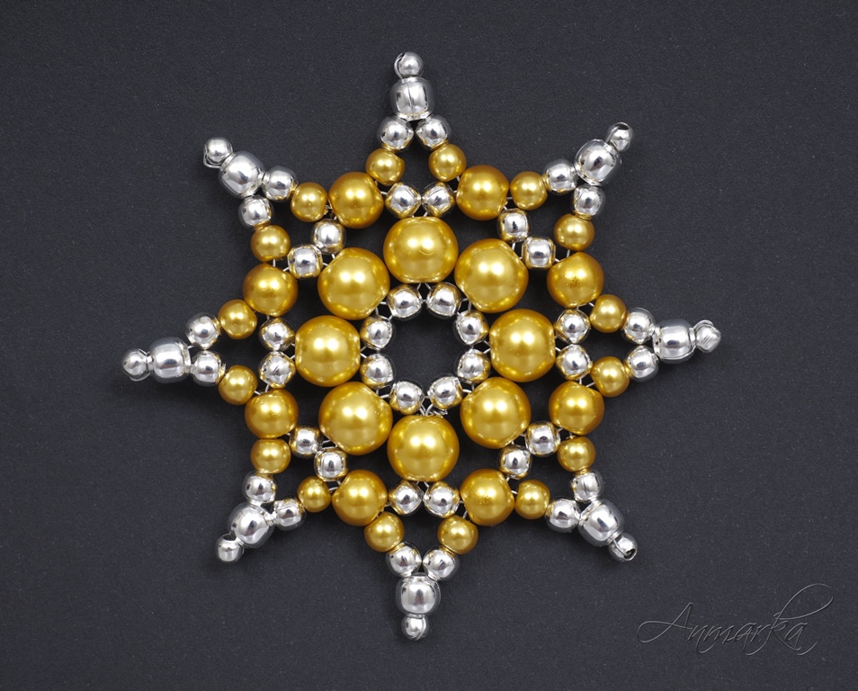 kovová hvězda žluto-stříbrná