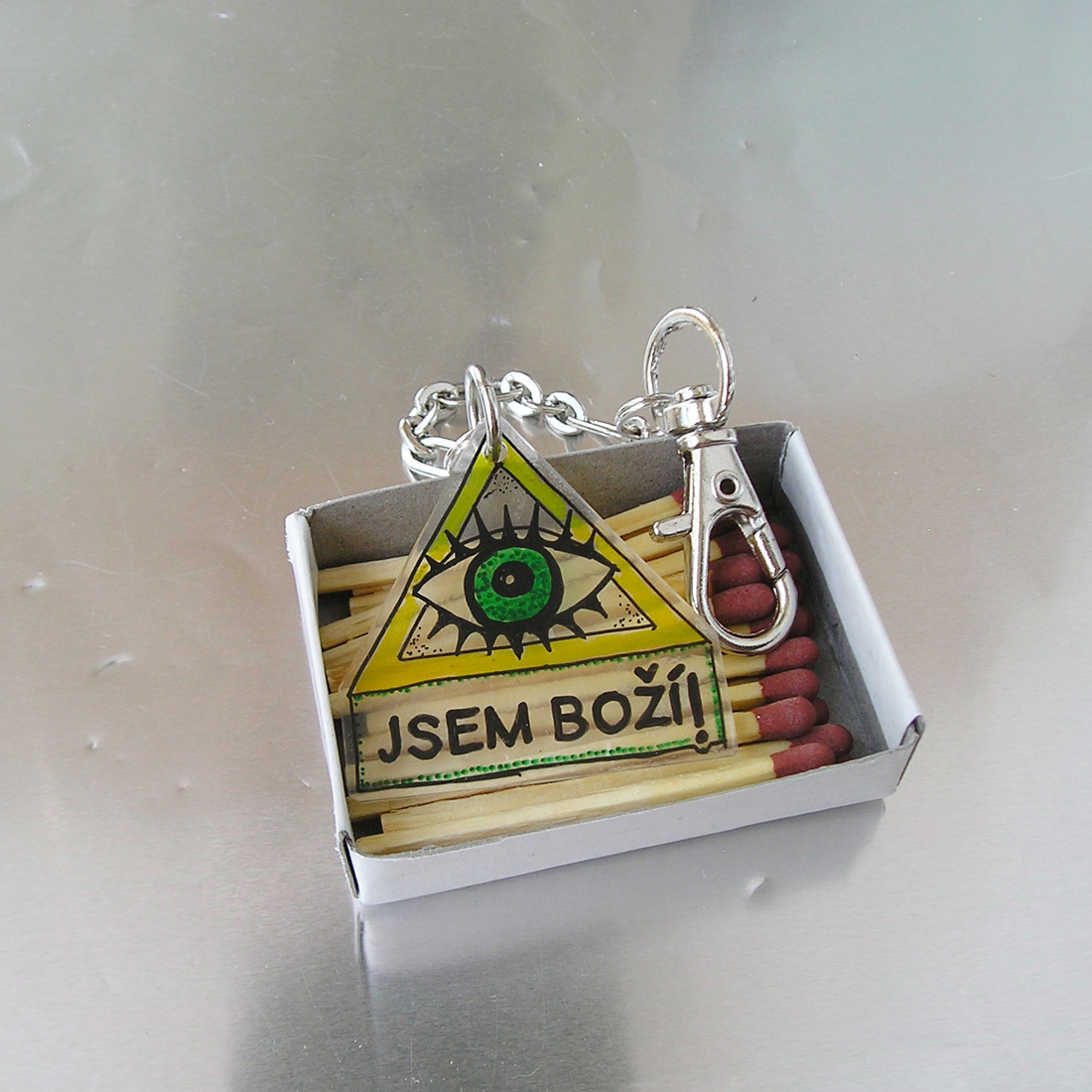 Jsem boží (zelené oko)