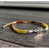 Náramek Shamballa s kovovým ornamentem