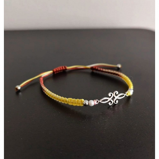 Náramek Shamballa s kovovým ornamentem