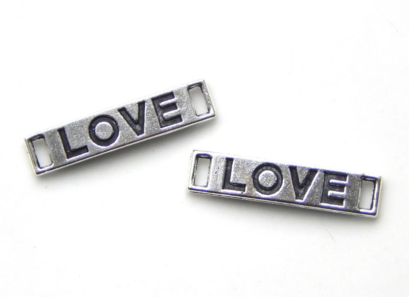 Spojovací díl s nápisem Love