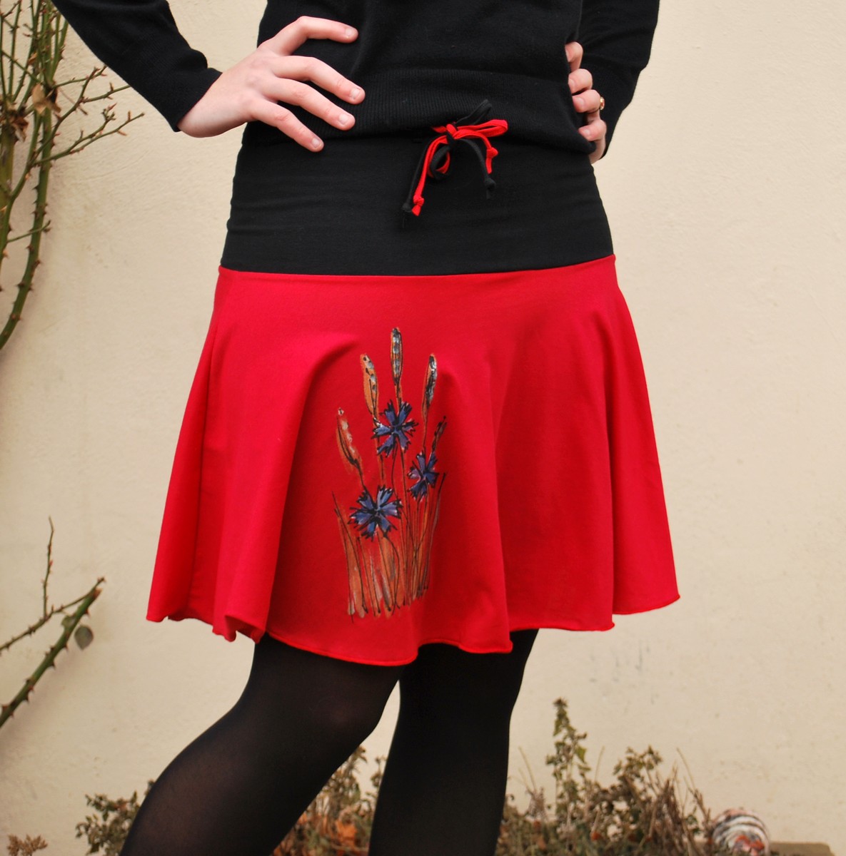 Chrpy v obilí v červené