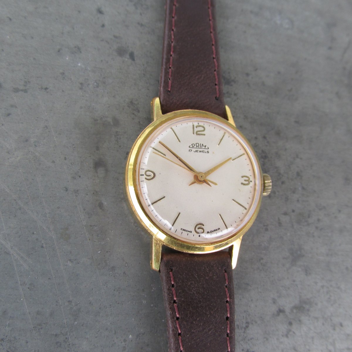 Dámské náramkové hodinky PRIM z roku 1967, zlacené
