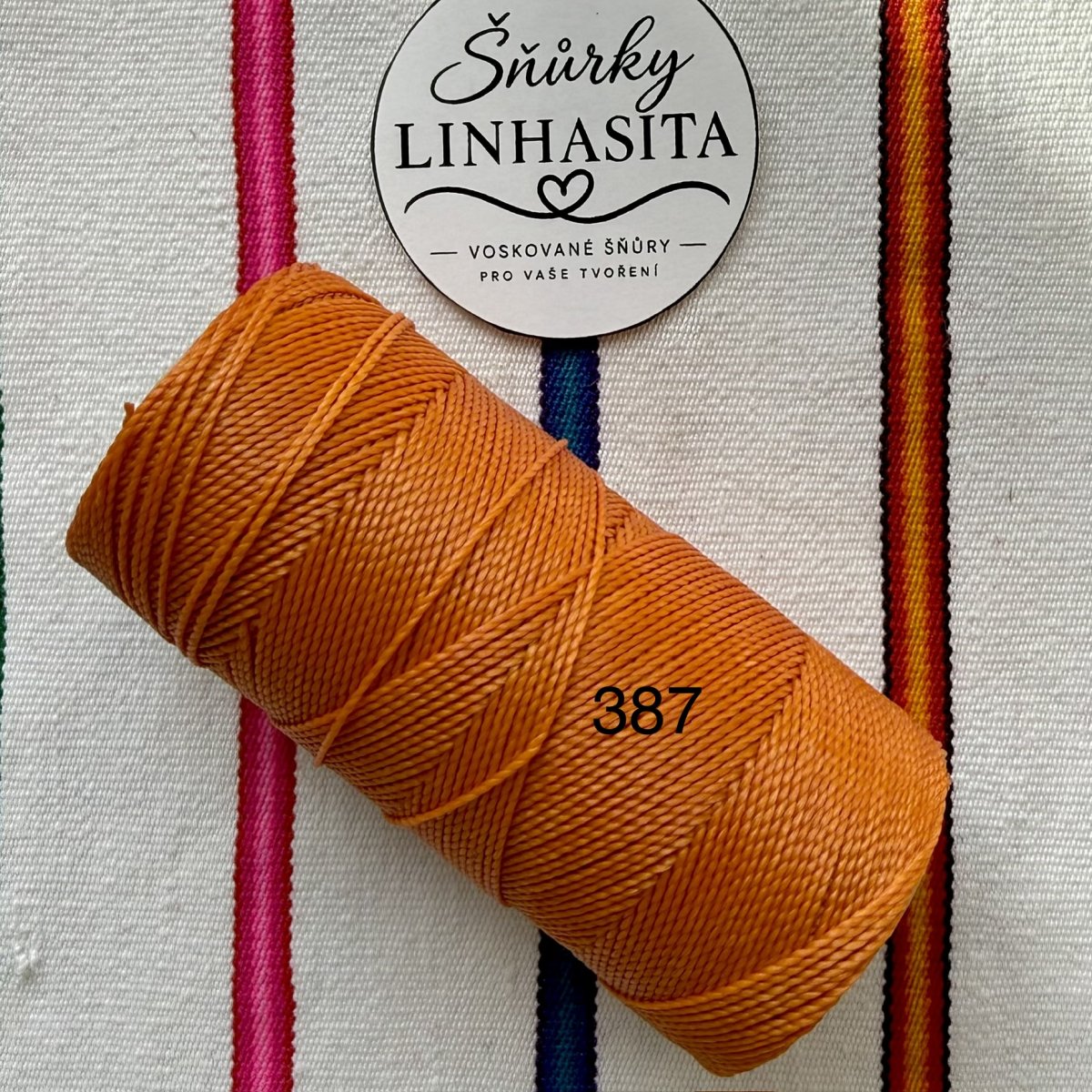 Linhasita 1 mm 387 celá cívka (tmavě oranžová)