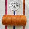 Linhasita 1 mm 387 celá cívka (tmavě oranžová)