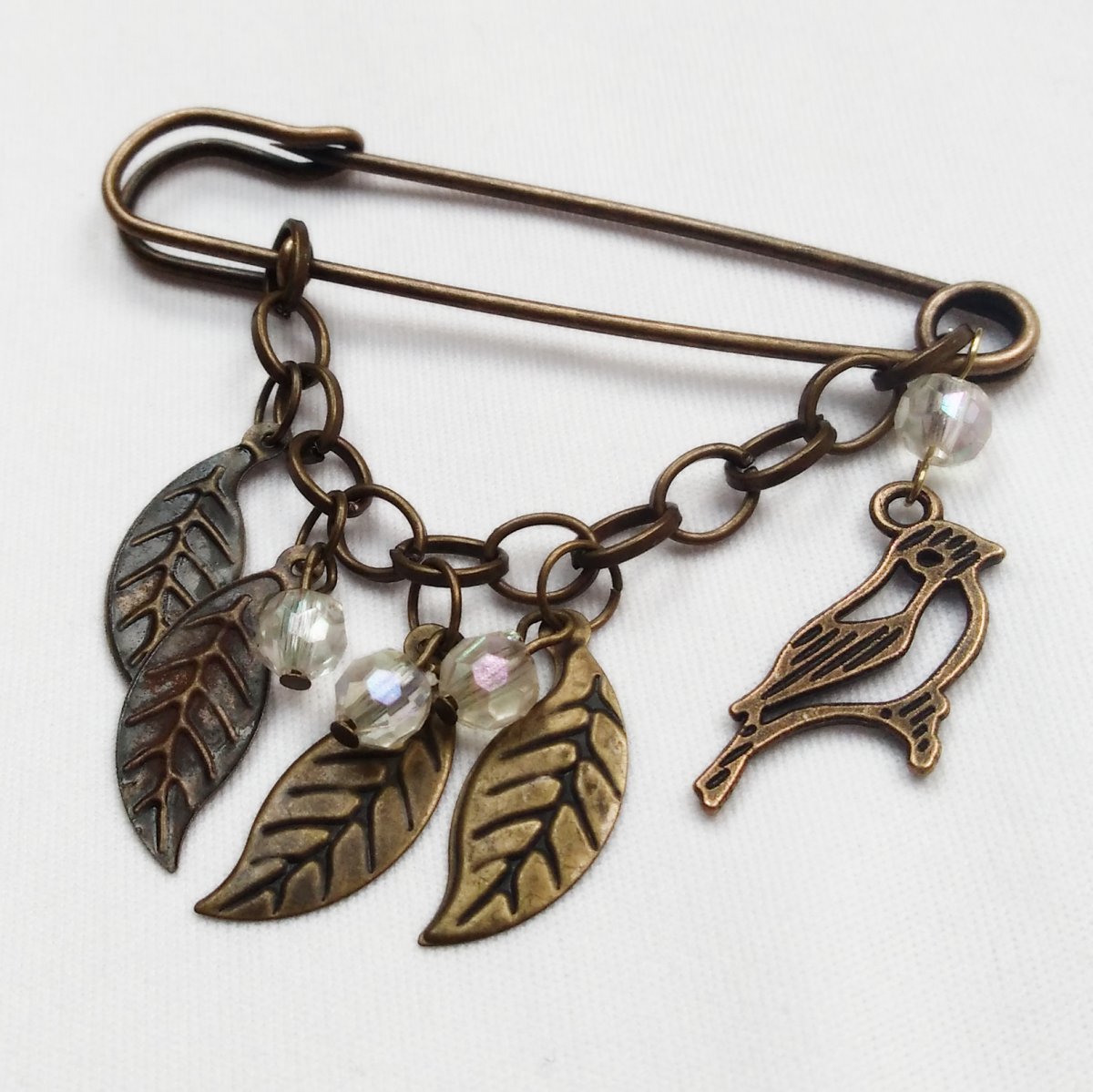 Ozdobný spínací špendlík, ranní zpěv