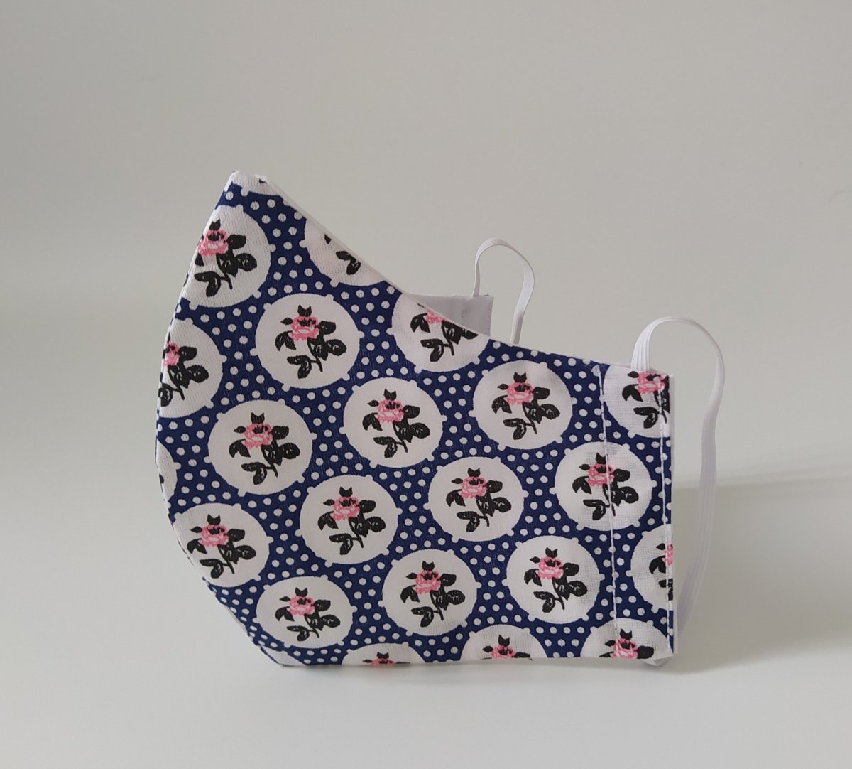 Bavlněná rouška dvouvrstvá bílé puntíky na modré