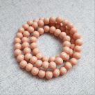 Světle broskvové korále - dřevěné