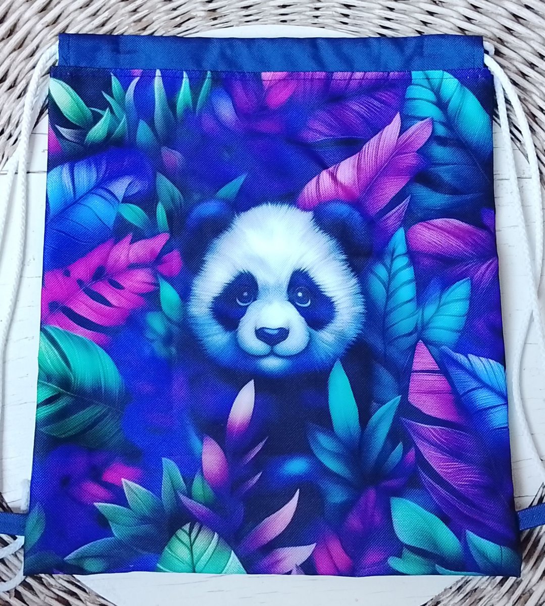 Stahovací vak S panda v listí