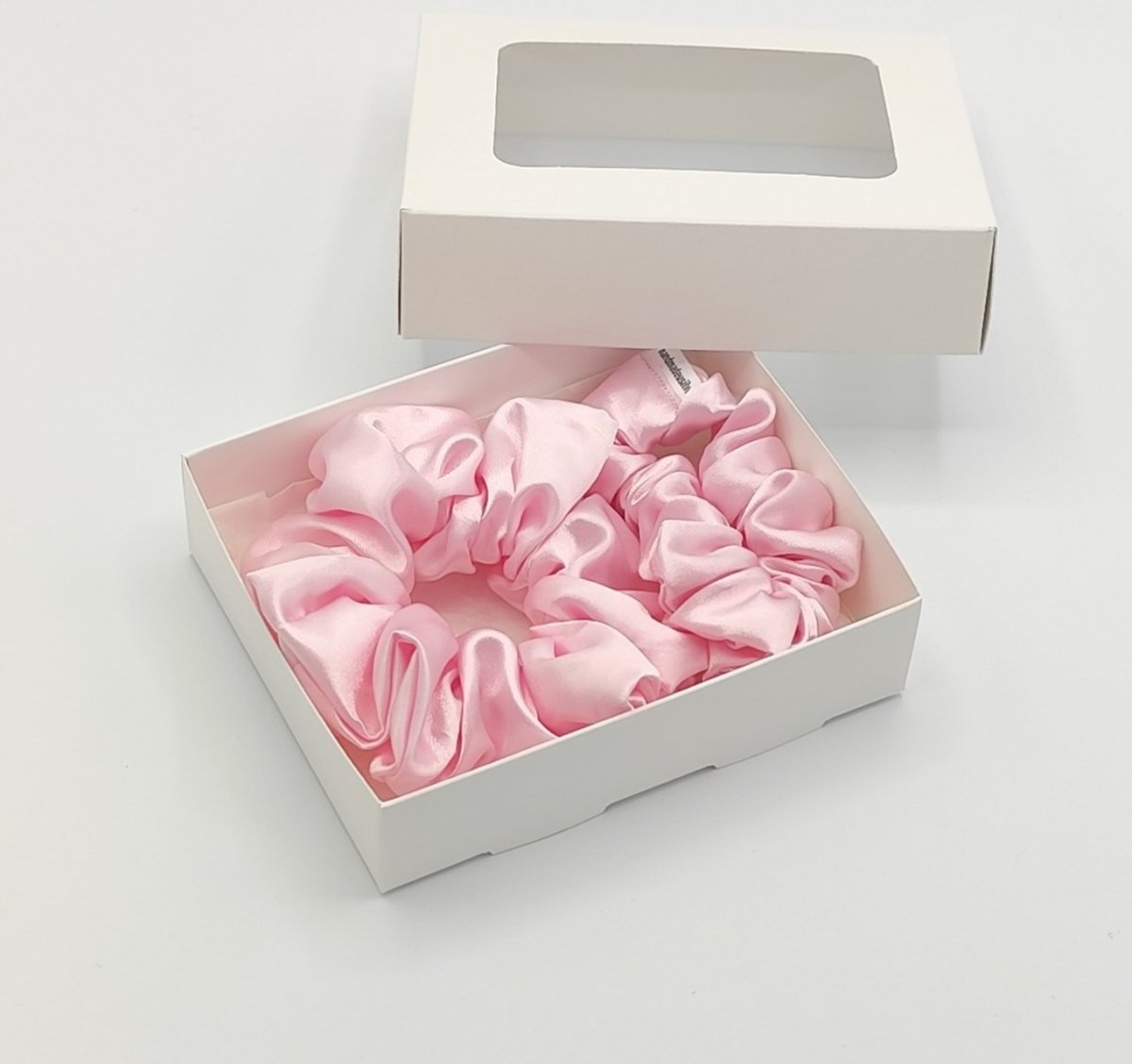 Sada dvou světle růžových gumiček L-klasik a S