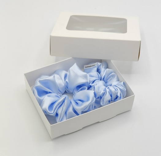 Sada dvou světle modrých gumiček L-klasik a S