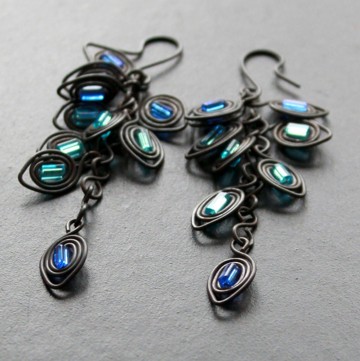 NÁUŠNICE TAJEMNÝ MODRÝ PÁV