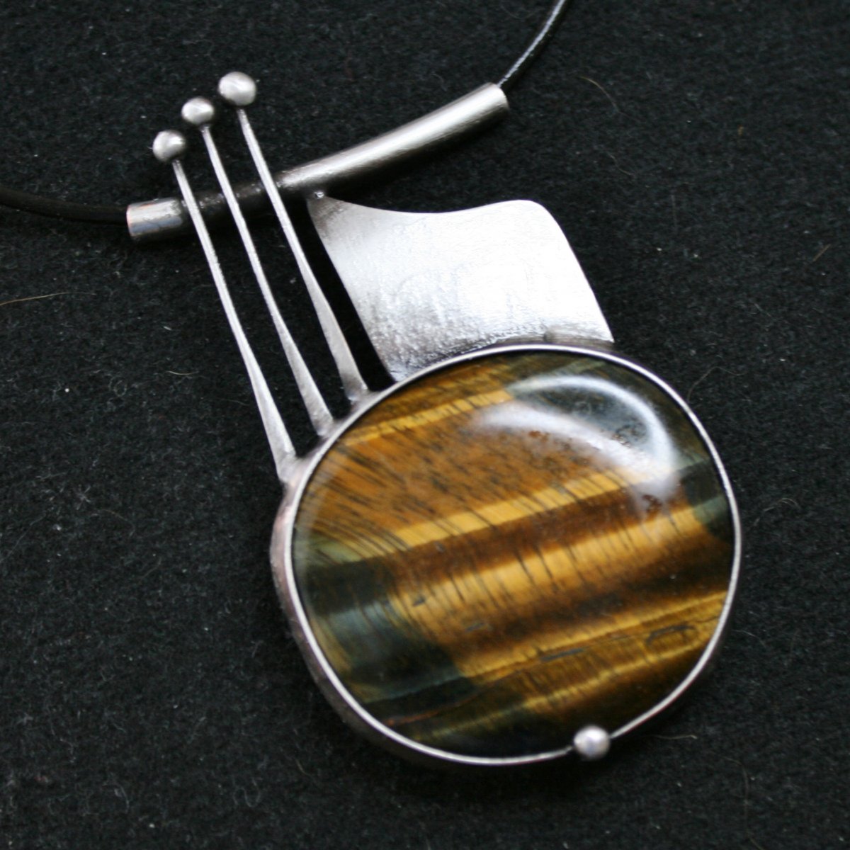 Prozářený sluncem - tygří oko multicolor   