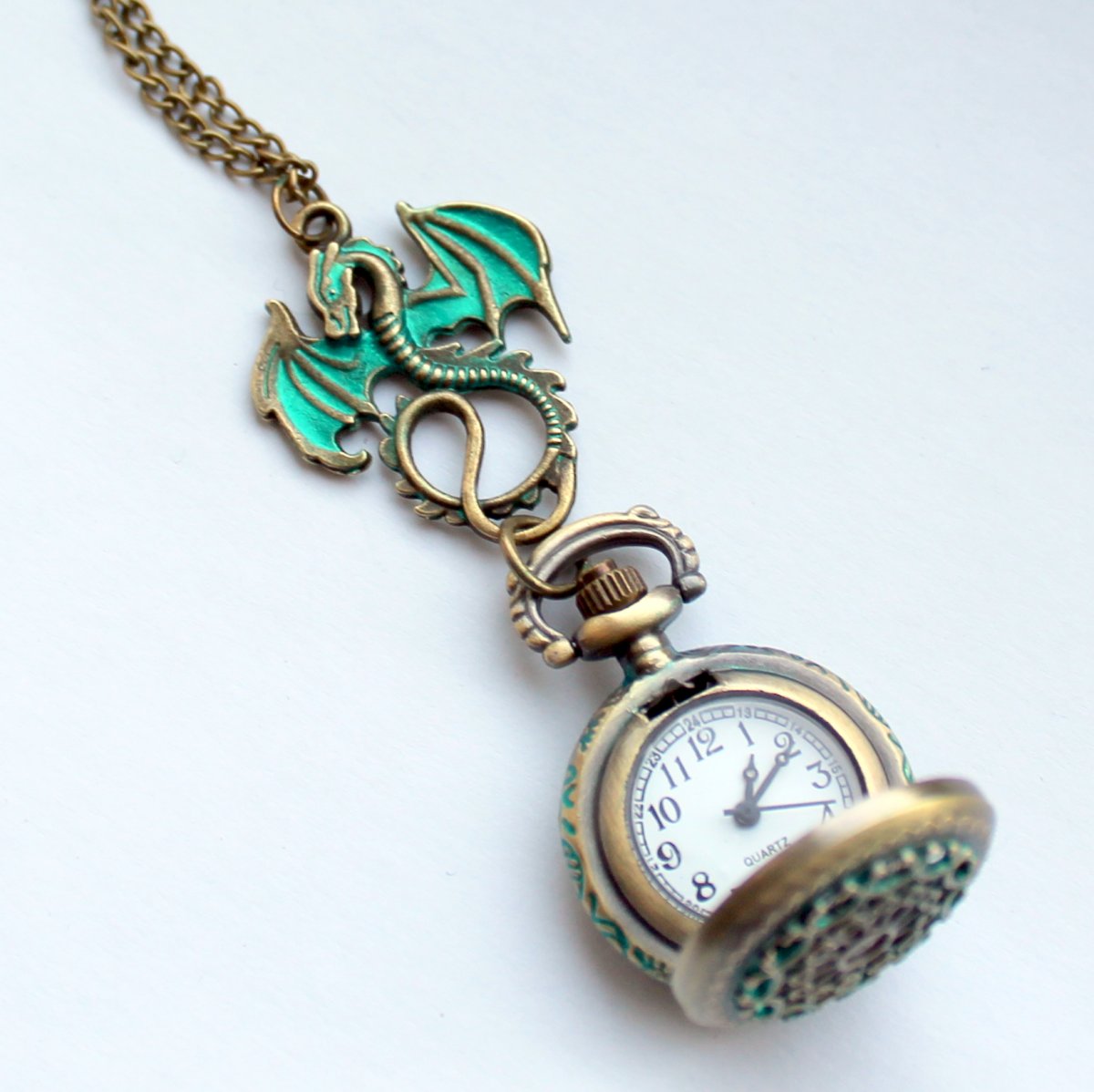 Bronzové hodinky s drakem
