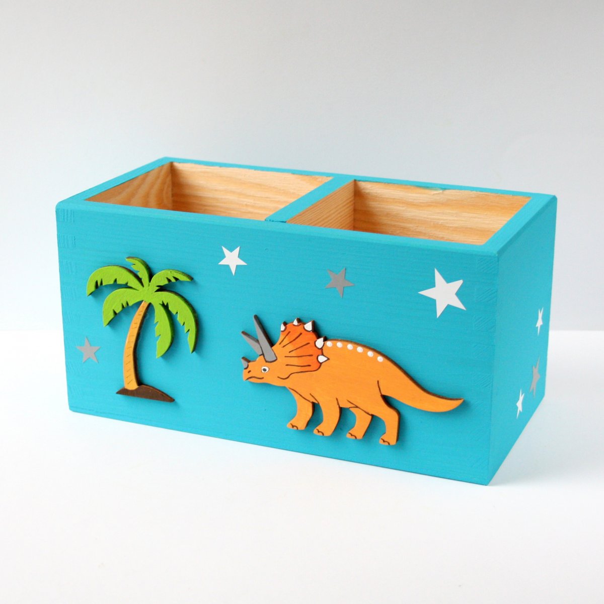 Dvojitý tužkovník s dinosaurem