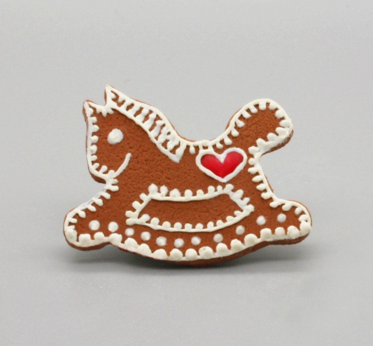 brož .. perníček jako houpací koník