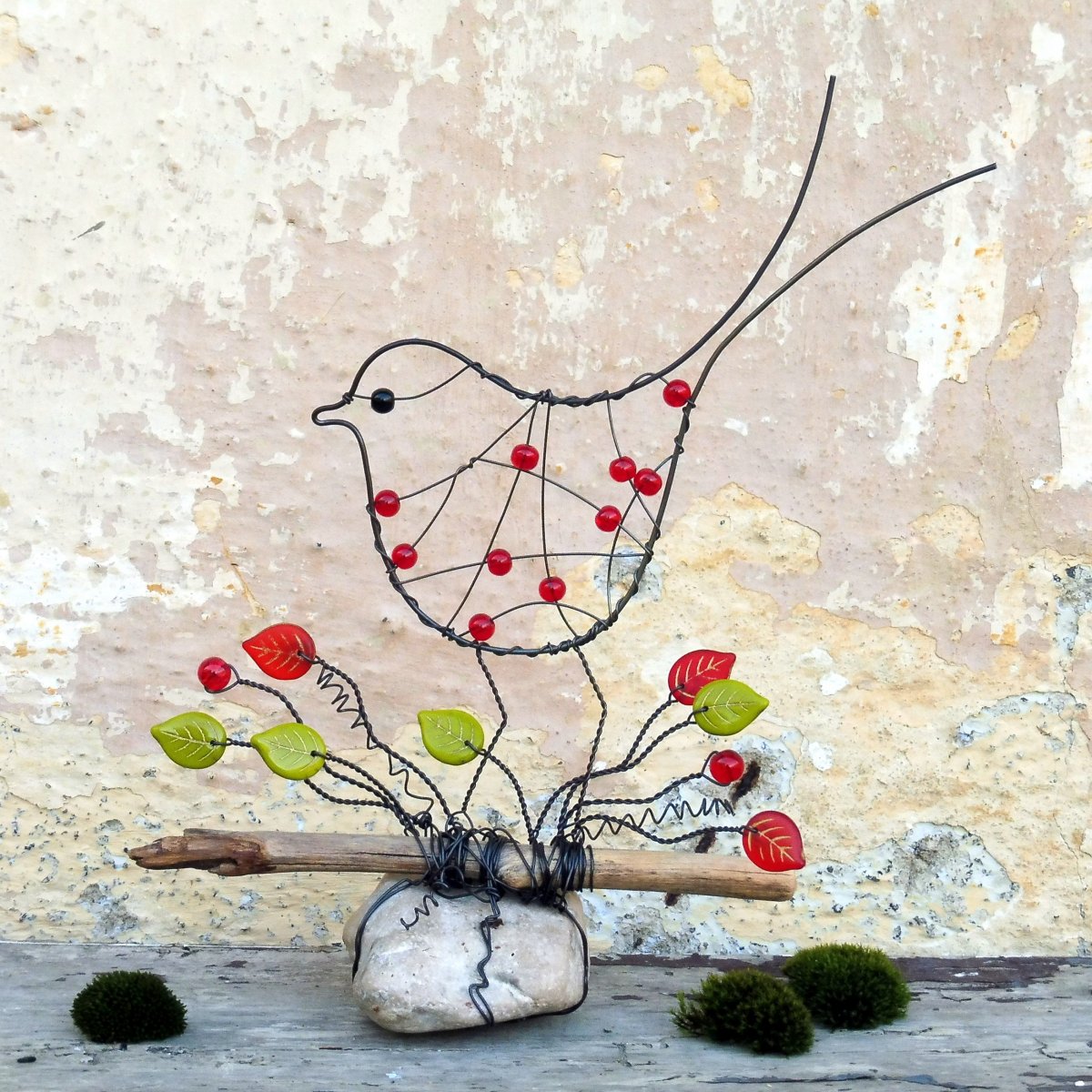 Ptáček na říčním kameni