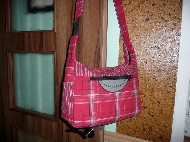 Taškabelka větší červená