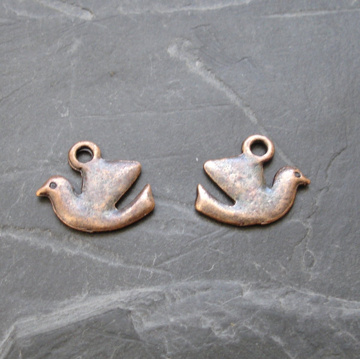 Přívěsek ptáček 15x13mm - staroměděný - 2 ks