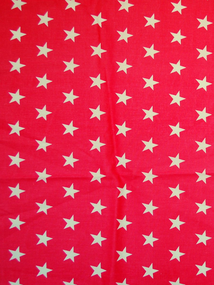 Bavlna s potiskem hvězdiček.