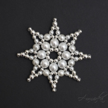 kovová hvězda bílo-stříbrná