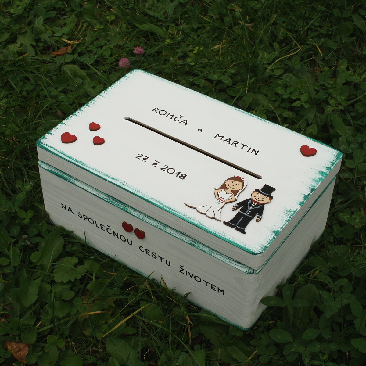 Velká svatební truhla s novomanželi