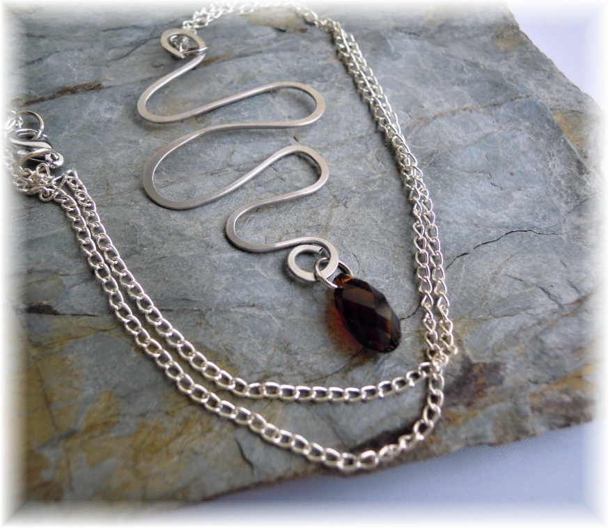 Tepaný se swarovski křišťálem