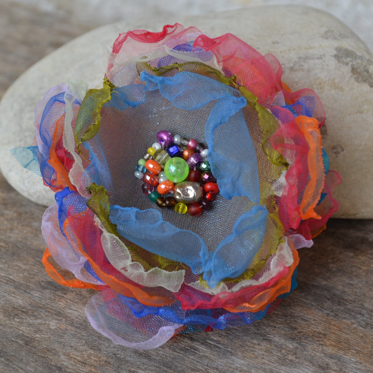 třapatka - brož duhová